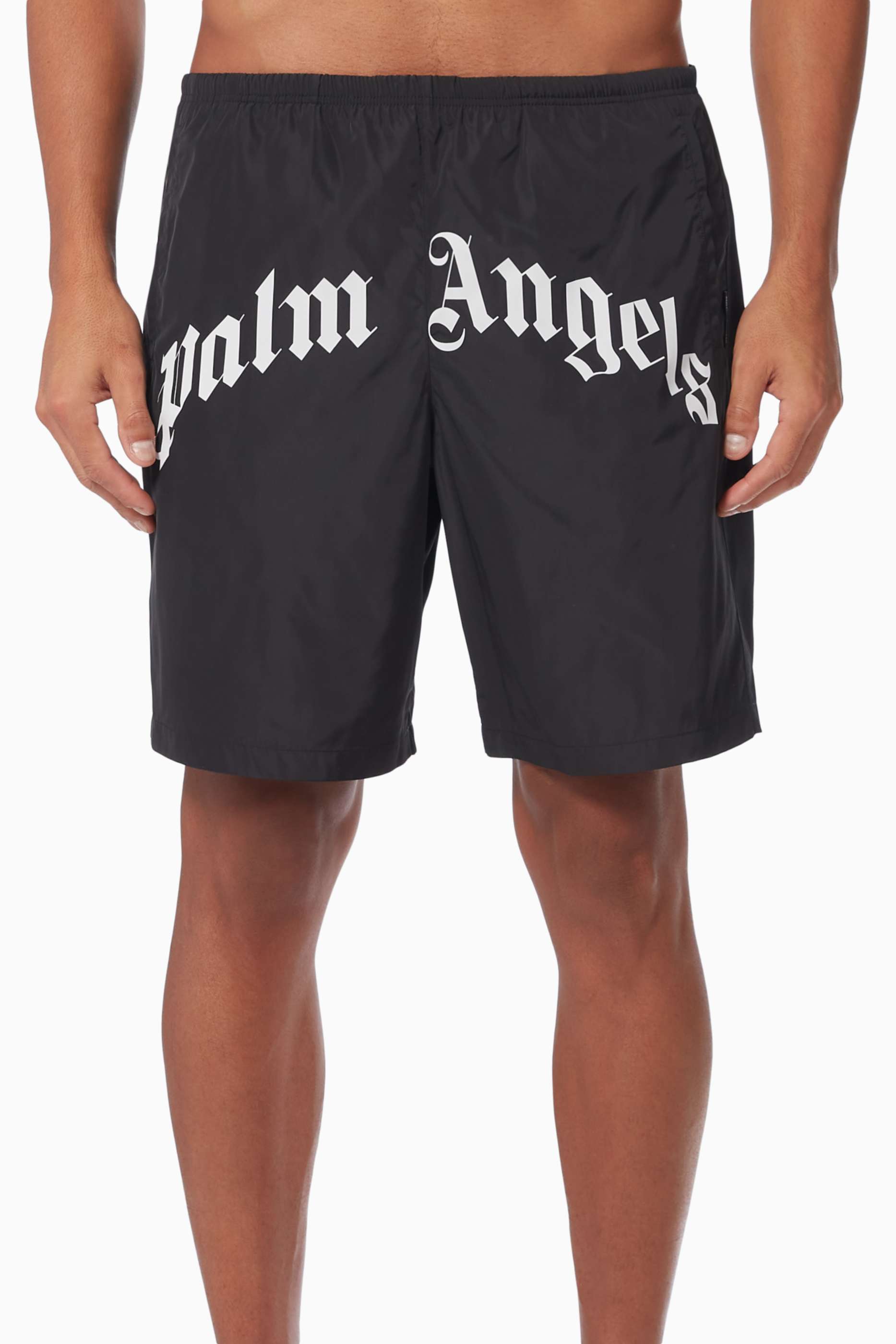 Shop Palm Angels Black Curved Logo Swim Shorts in Nylon for Men 